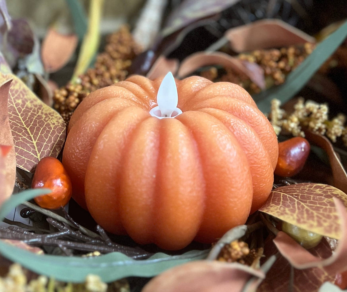 Pumpkin LED Flameless Candle Size: 4.5x2.75 in.