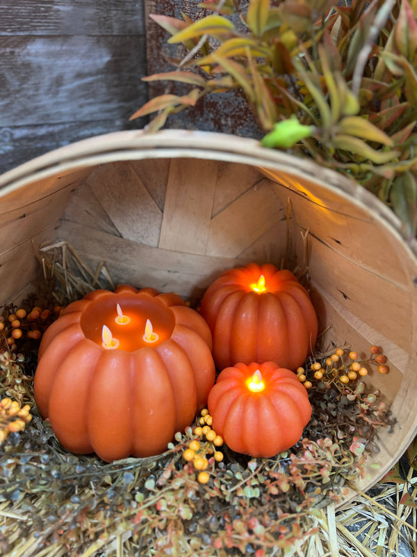 Pumpkin LED Flameless Candle Size: 4.5x2.75 in.